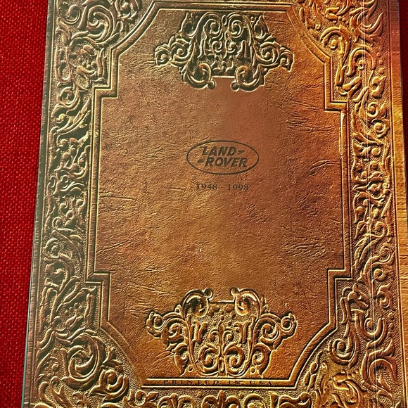 17pc LAND ROVER 50TH ANNIVERSARY COLLECTION BOOKS PINS BADGE PATCH TOY VHS MORE - Picture 14 of 16